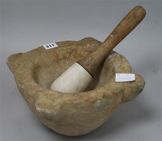 An 18th century church water filter (used as a mortar), together with a pestle, stamped Wedgwood